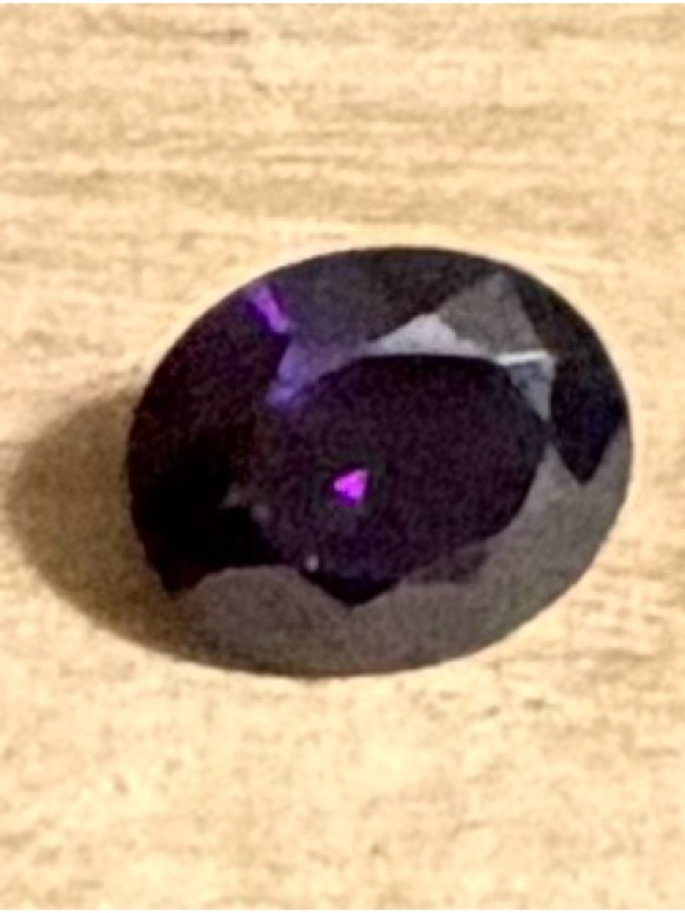 Faceted Oval Deep Purple Sapphire gemstone